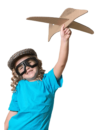 Child playing with cardboard airplane
