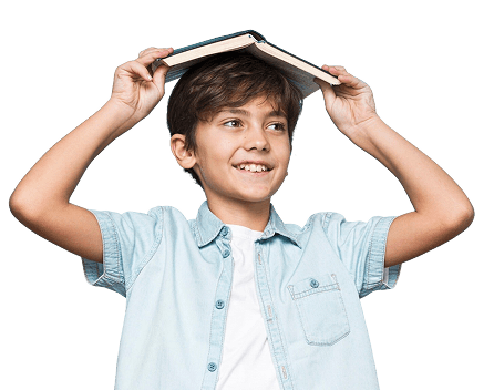 Boy holding books over his head